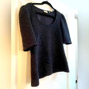 Anthropologie Black textured puff shoulder top size L